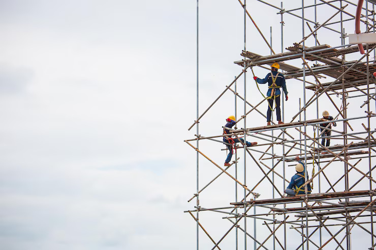 worker-male-assembly-progress-storage-new-tank-oil-inspection-scaffolding_478515-7832